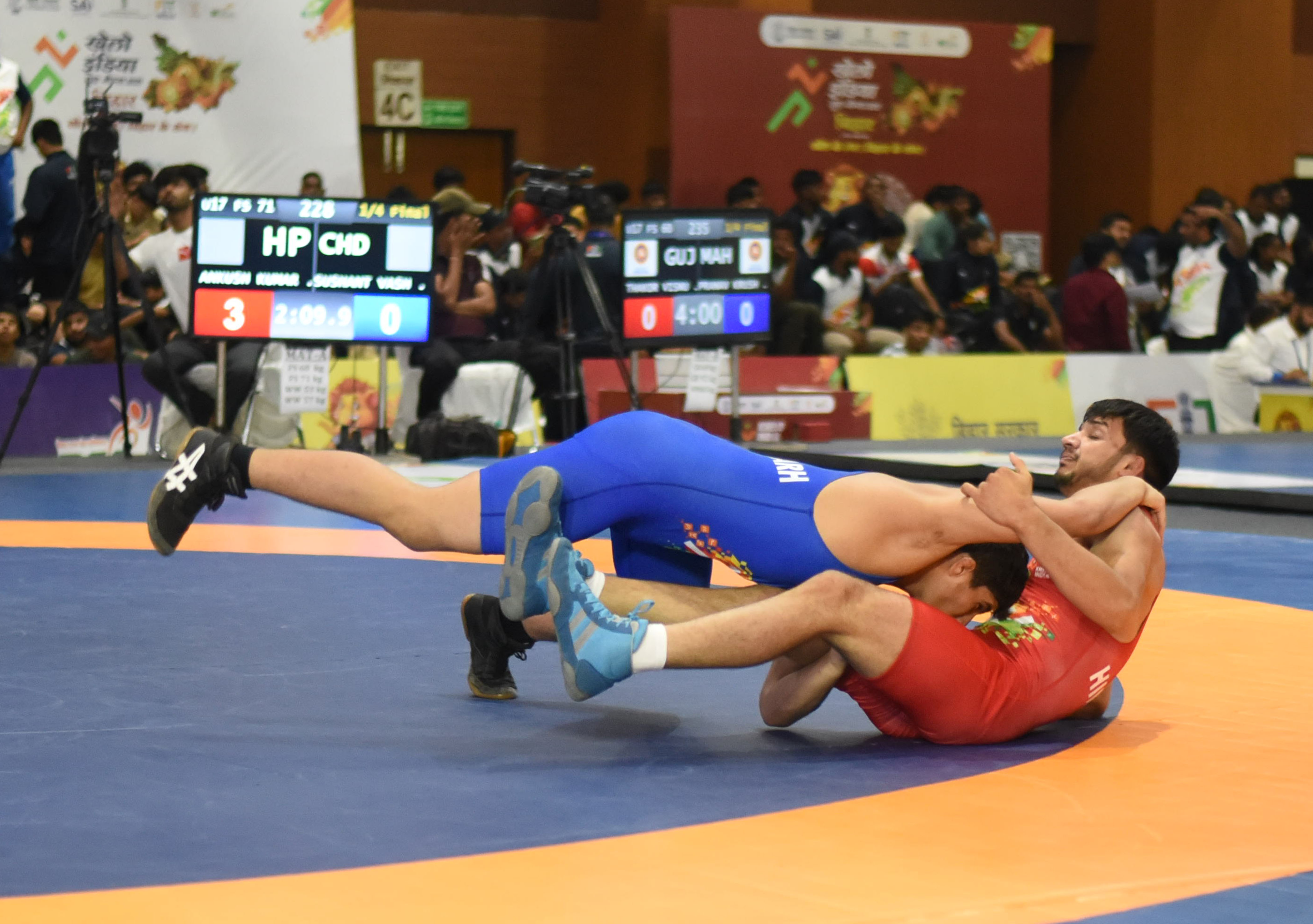 पुरुष कुश्ती स्पर्धा में हिमाचल प्रदेश के अंकुश कुमार और चंडीगढ़ के सुशांत दाश खेलो इंडिया यूथ गेम्स 2025 में अपनी प्रतिस्पर्धा का प्रदर्शन करते पुरुष कुश्ती स्पर्धा में हिमाचल प्रदेश के अंकुश कुमार और चंडीगढ़ के सुशांत दाश खेलो इंडिया यूथ गेम्स 2025 में अपनी प्रतिस्पर्धा का प्रदर्शन करते